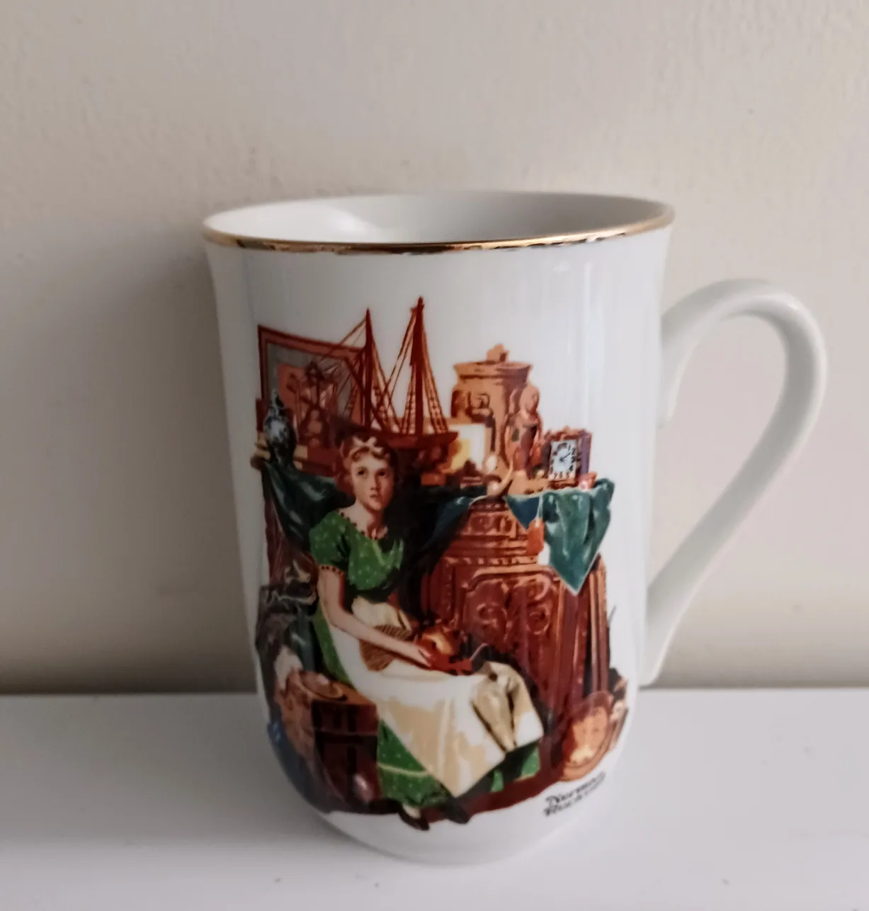 Set of 4 Vintage Gold rimmed Norman Rockwell Collector's mugs image indicator(4)