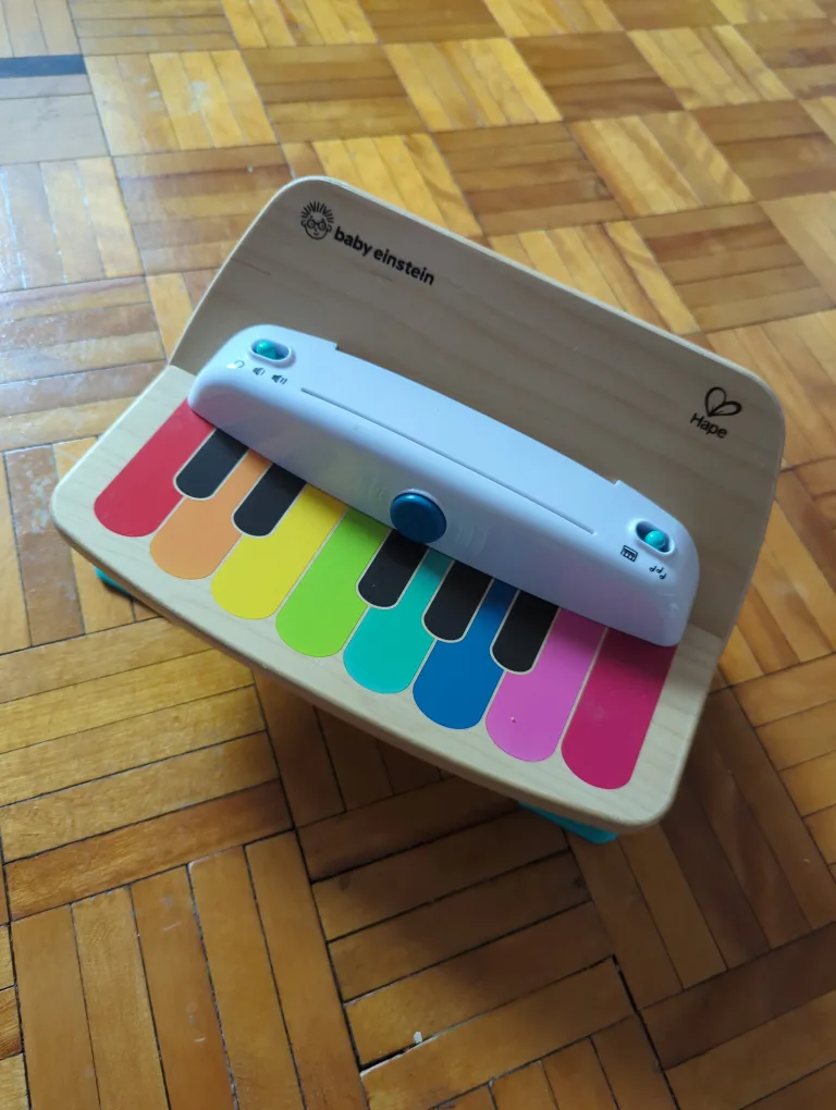 Baby Einstein Hape Take Along Tunes Musical Toy thumbnail