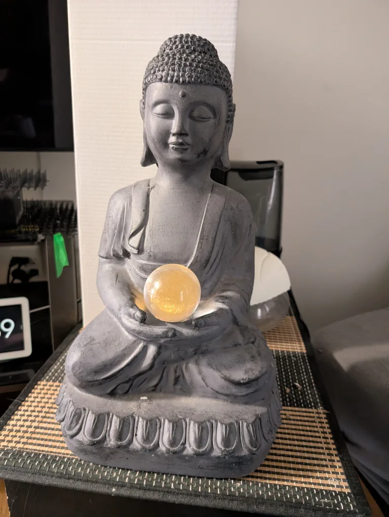 Angelo Décor 18.5-inch Solar Buddha with Orb Statue thumbnail