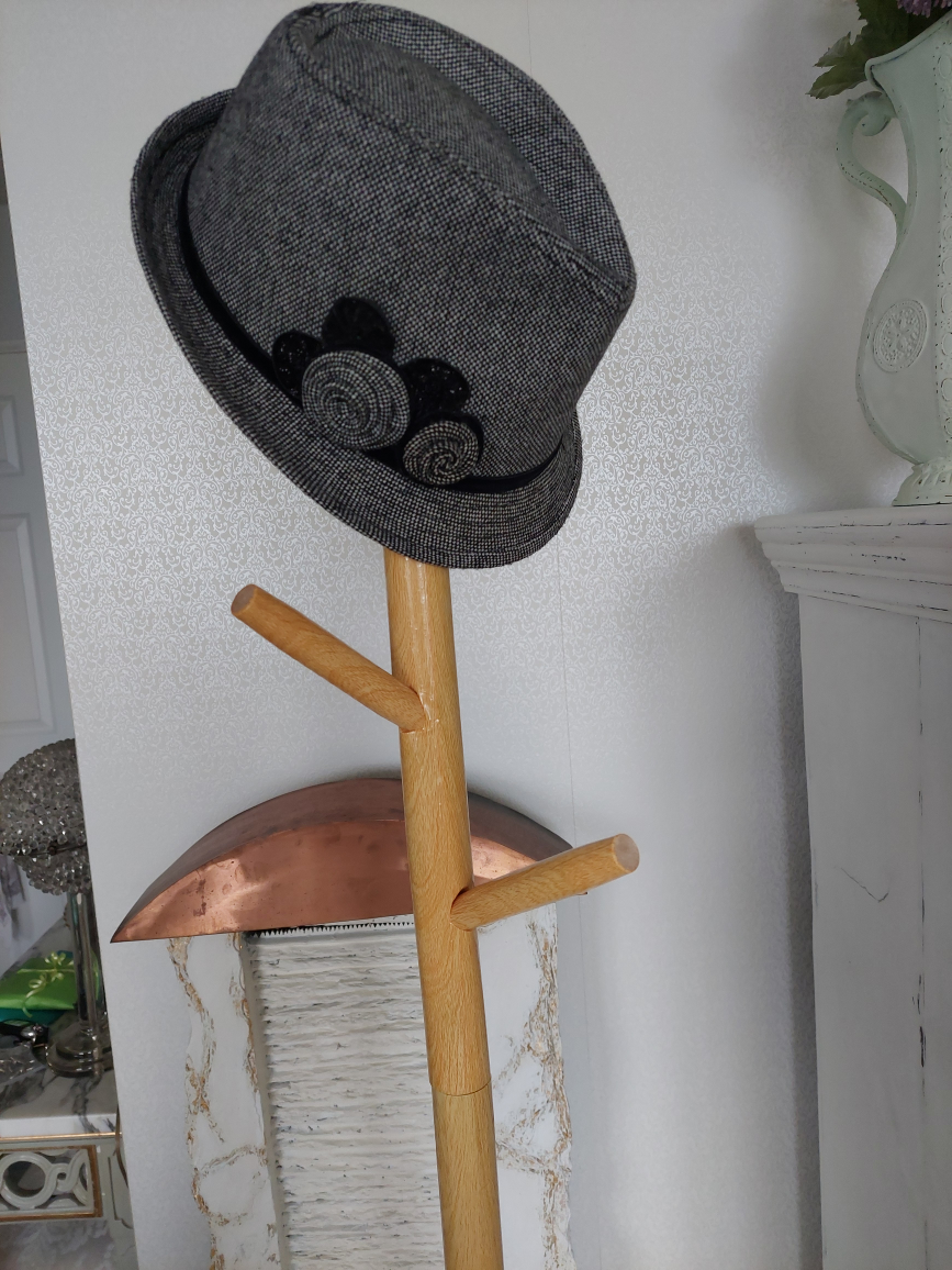 versatile coat, hat rack with 8 removable pegs. 68.75" tall.
