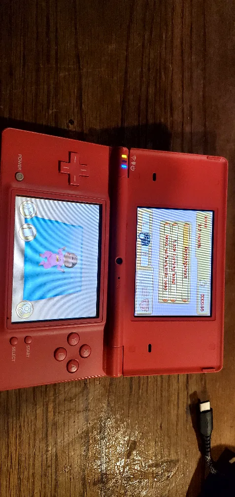 Nintendo DS I. pink and withe with Games & Charger thumbnail