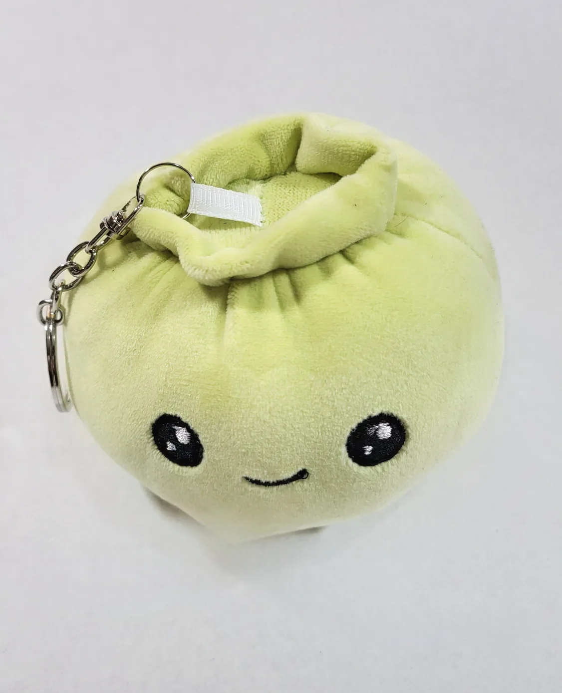 Cute Green Plush Dumpling Keychain thumbnail
