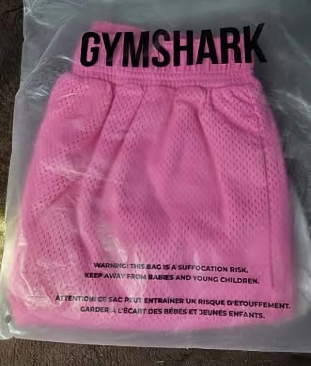 Pink Gymshark mesh shorts (Size S) thumbnail