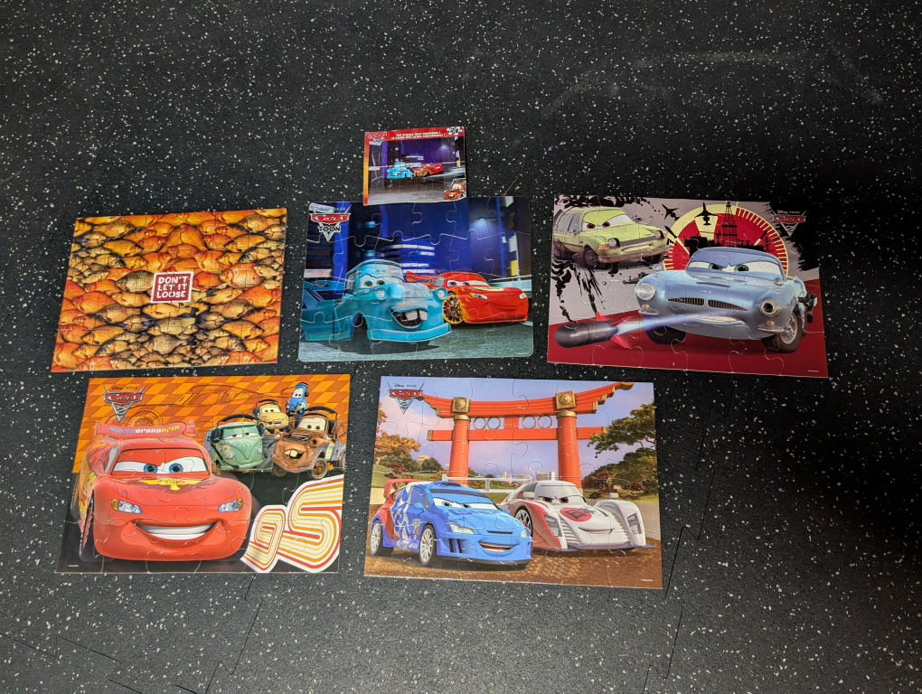 5x 24pc puzzles - Disney Pixar Cars and one goldfish themed