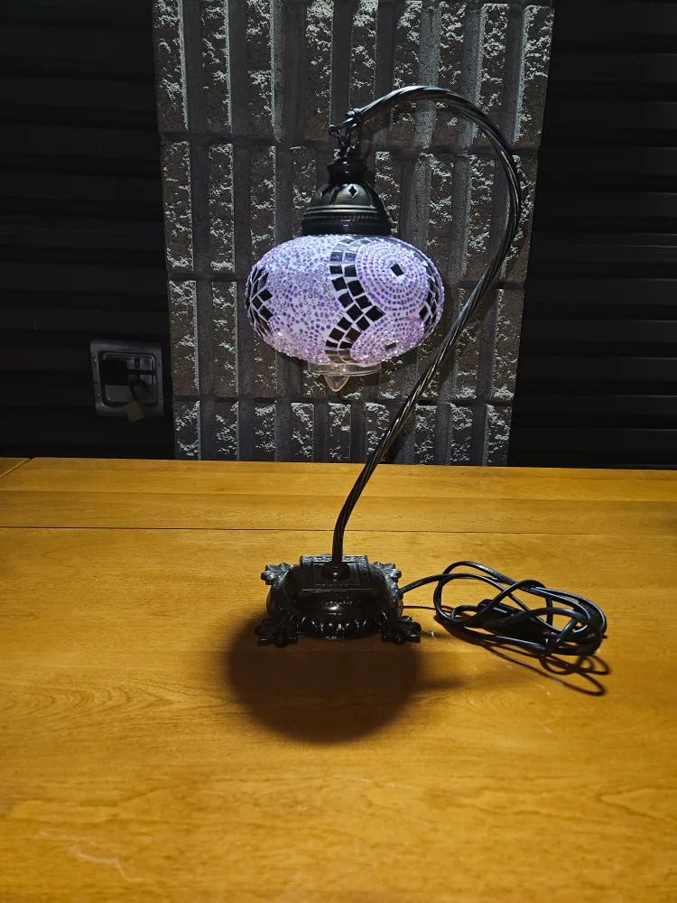 Desk , shelf lamp with purplish bulb glass.  Classy looking thumbnail