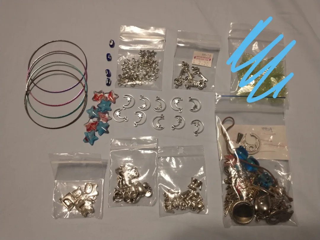 Large assortment of charms and pendants for jewellery making image indicator(8)