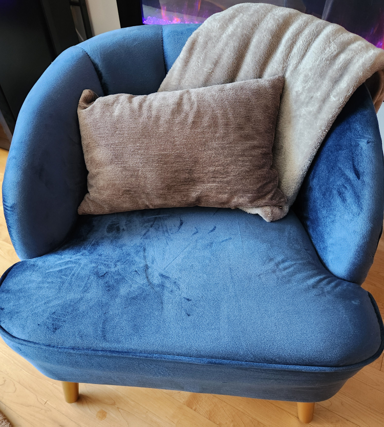 Blue velvet barrel chair