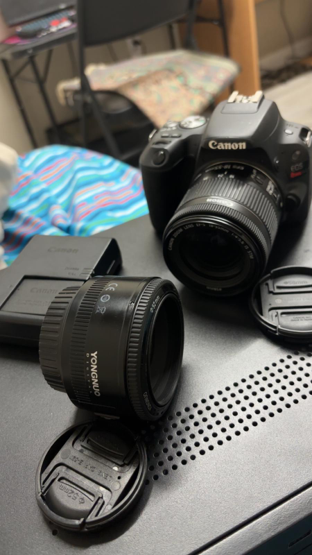 Canon SL2 DSLR + 18–55mm & 50mm Lens + Charger