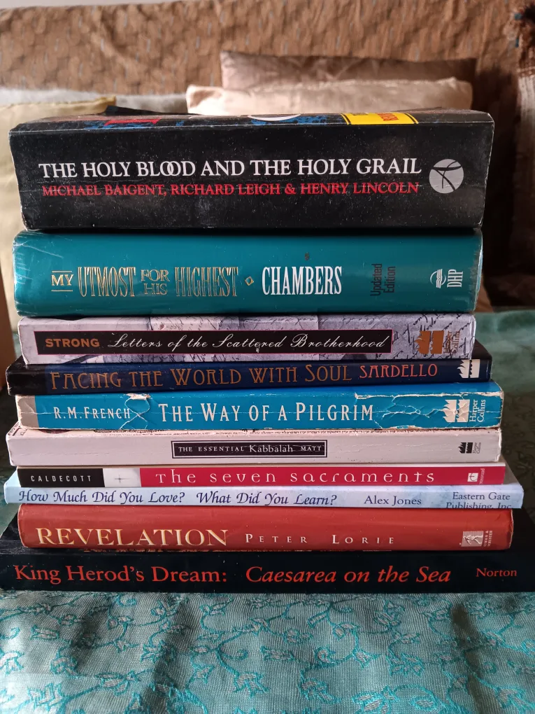 Stack of Various Sacred  Books thumbnail