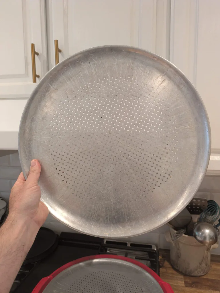Perforated pizza pans and serving platter image indicator(5)