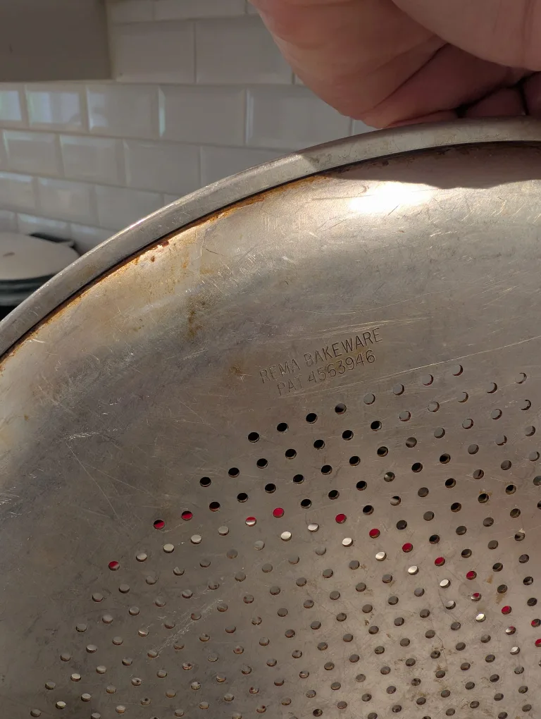Perforated pizza pans and serving platter image indicator(7)
