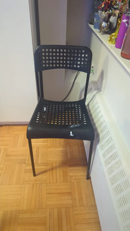 IKEA Black Plastic Chair thumbnail