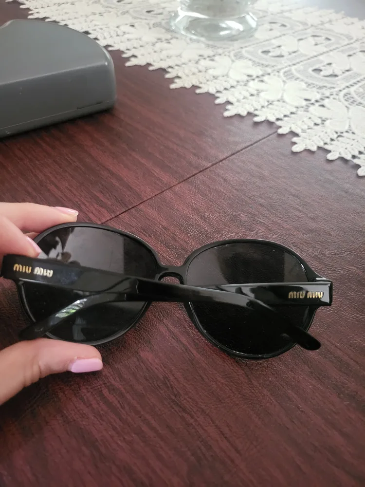 Miu Miu Black Sunglasses with Case image indicator(2)