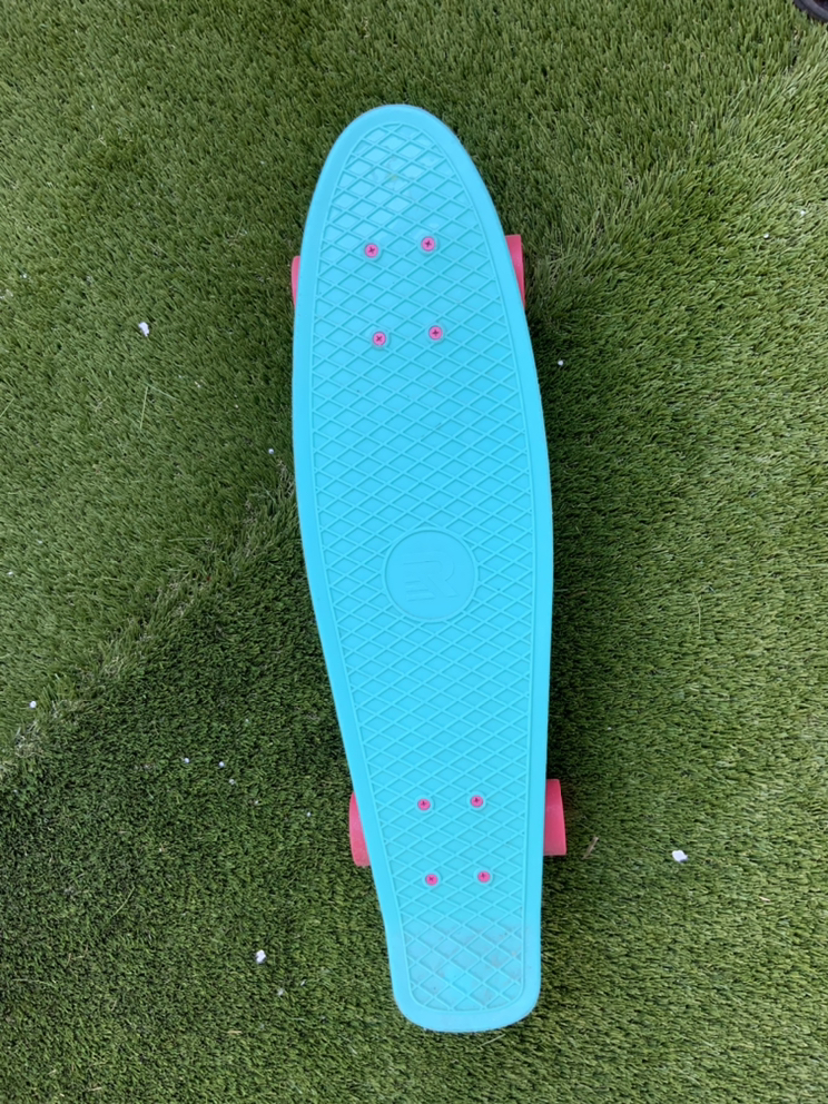 Sky blue skateboard with pink wheels