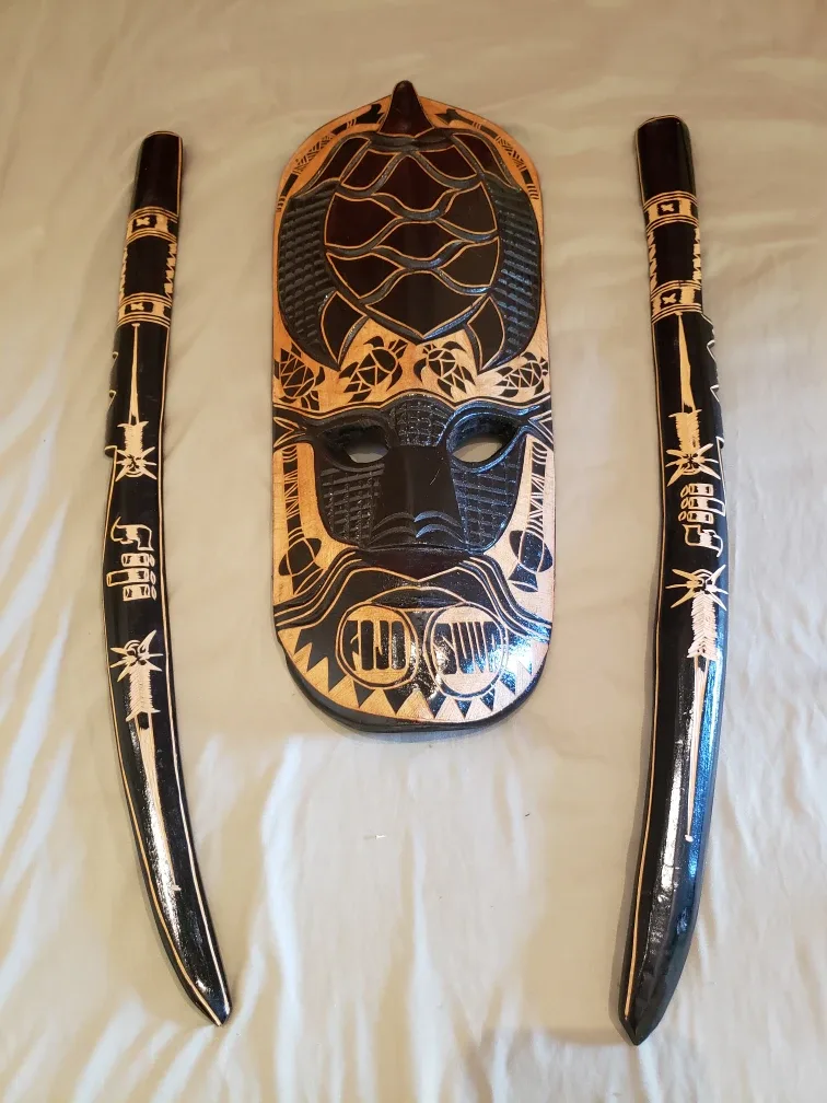 Hand Carved Wood Mask with Sticks thumbnail