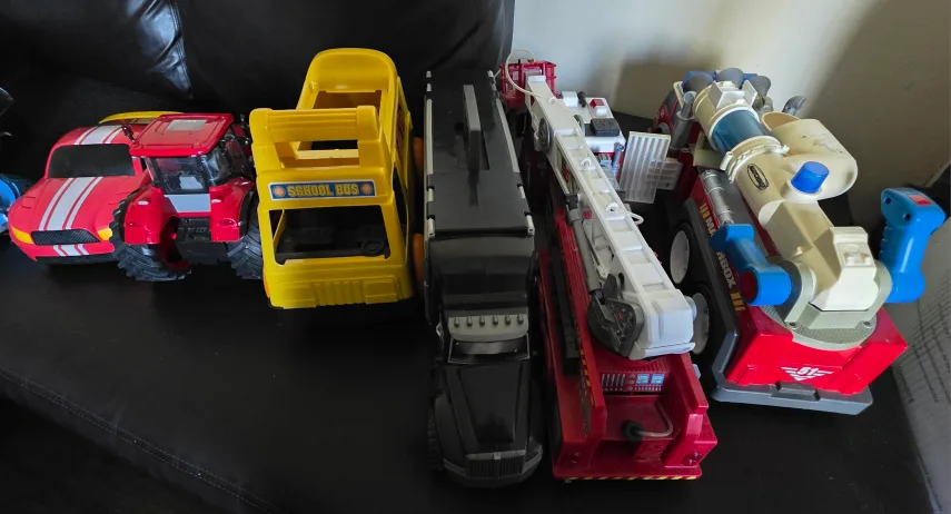 Assorted Toy Trucks and Vehicles thumbnail