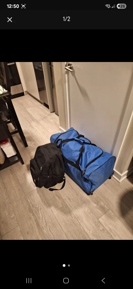 Blue Duffel Bag with wheels thumbnail