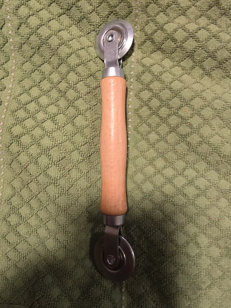 Seam roller with wooden handle thumbnail