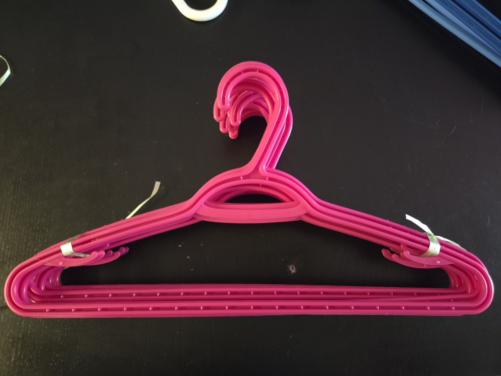 10 Pink Plastic Clothes Hangers