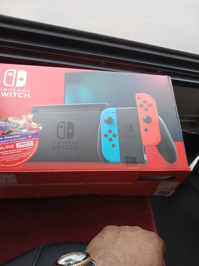 Nintendo Switch with Neon Blue and Red Joy-Con image indicator(2)