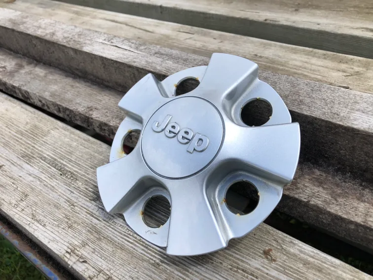 OEM Center hub Cap available for 2014-2017 Jeep Cherokee thumbnail