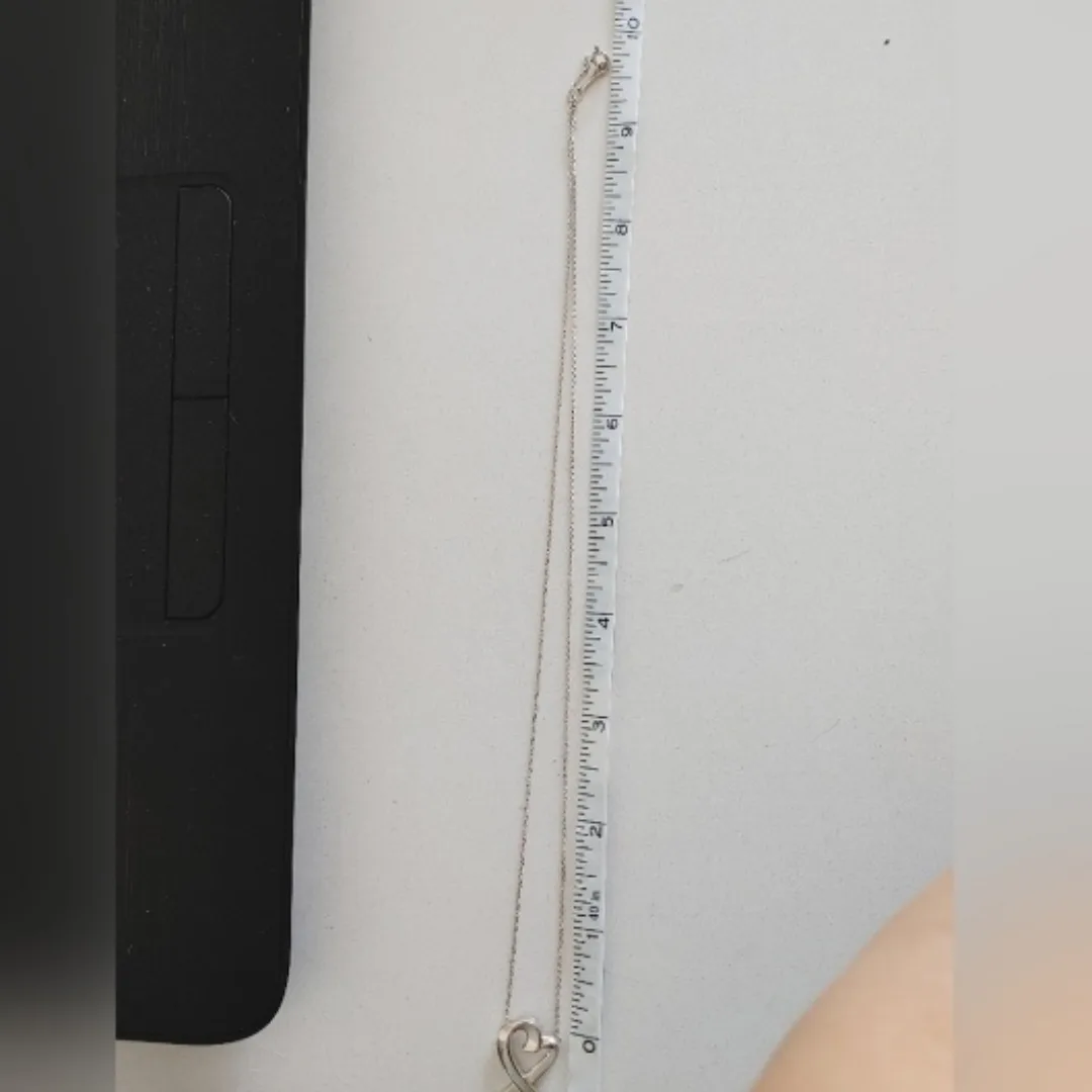 Tiffany & Co. Loving Heart Pendant Necklace image indicator(10)