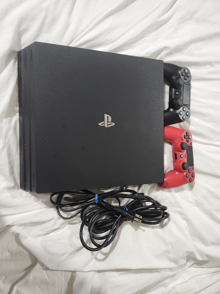 PlayStation 4 Pro Console with 2 Controllers