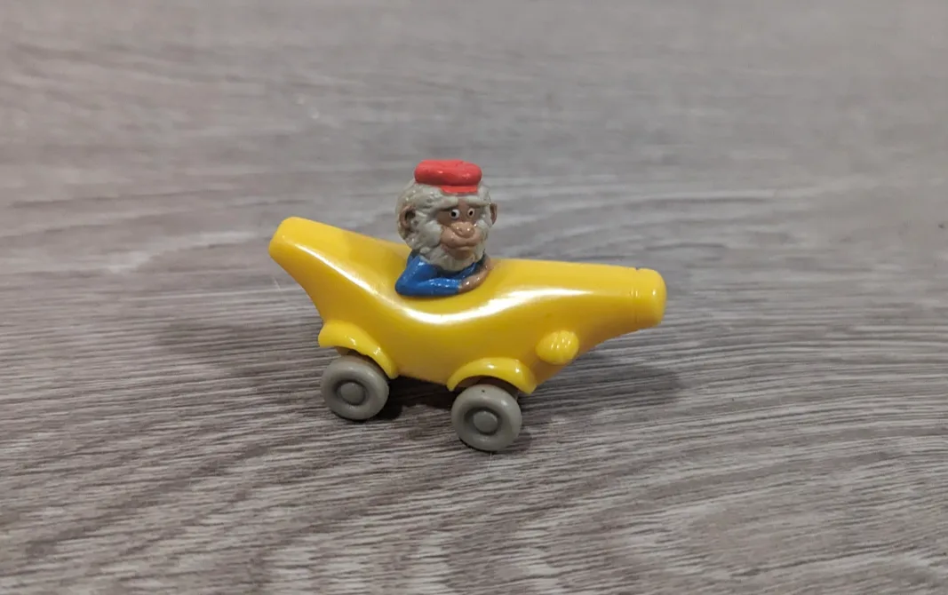 Vintage Monkey in Banana Car Toy thumbnail