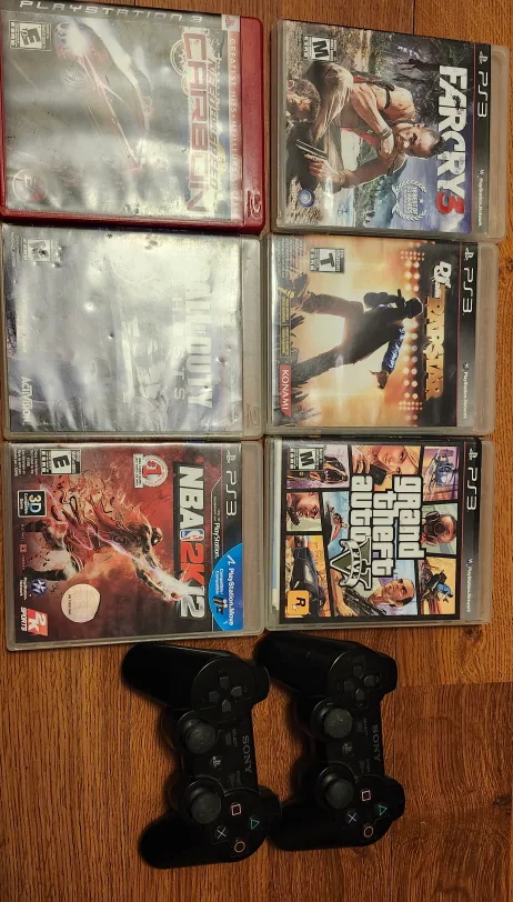 PS3 GAMES WITH 2 CONTROLLERS  $60 or obo image indicator(2)