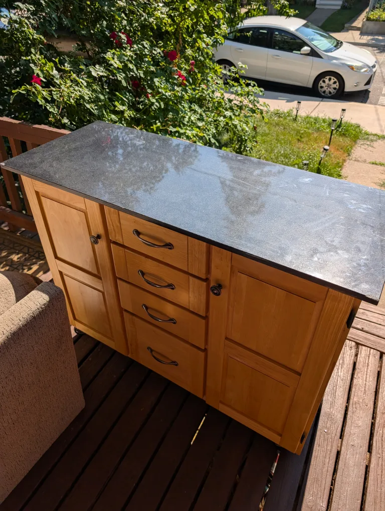 Wooden Kitchen Island with Black Countertop thumbnail