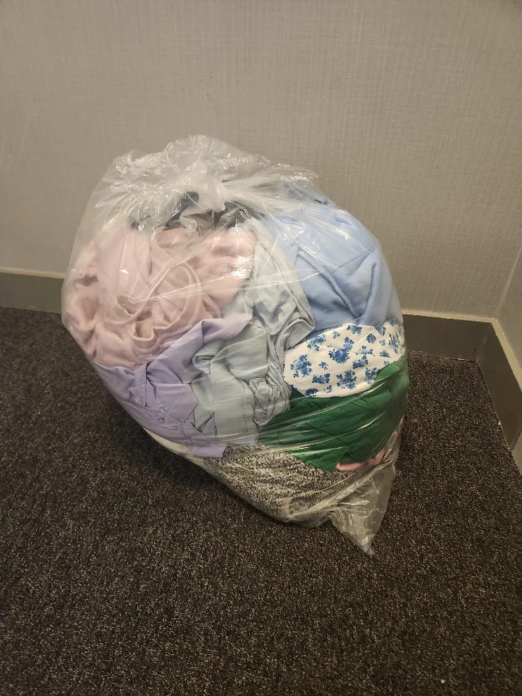 Bag of assorted clothing thumbnail