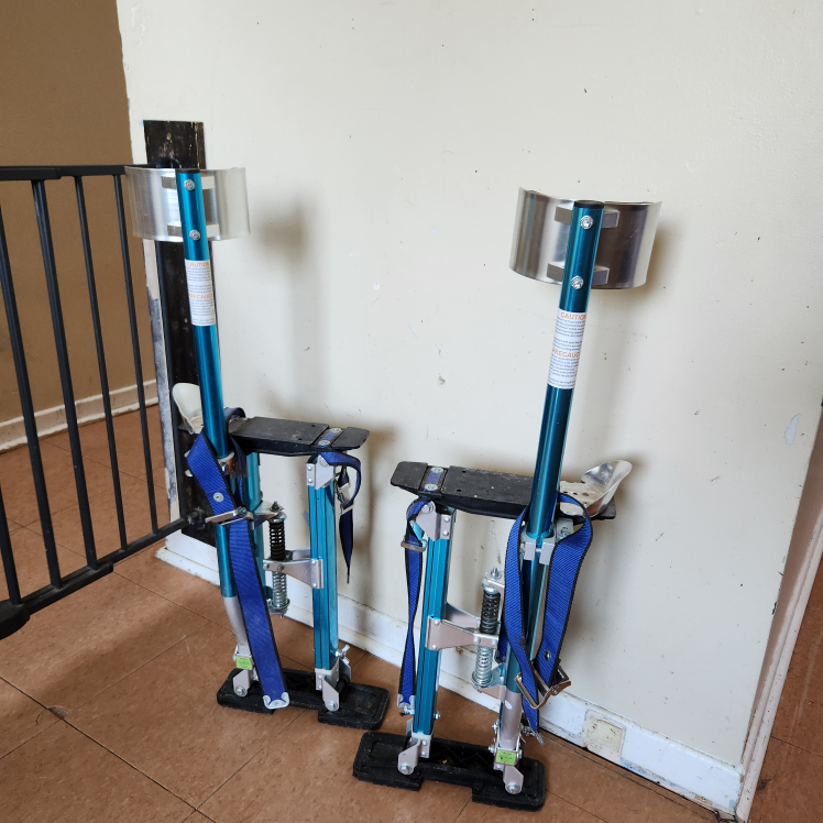 Adjustable drywall stilts,  never used.