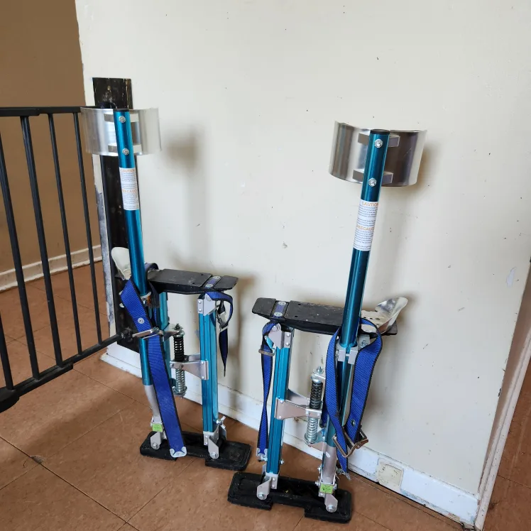 Adjustable drywall stilts,  never used. thumbnail
