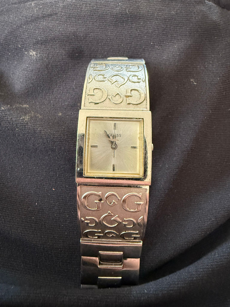 Guess Ladies' Silver-Tone Bangle Watch