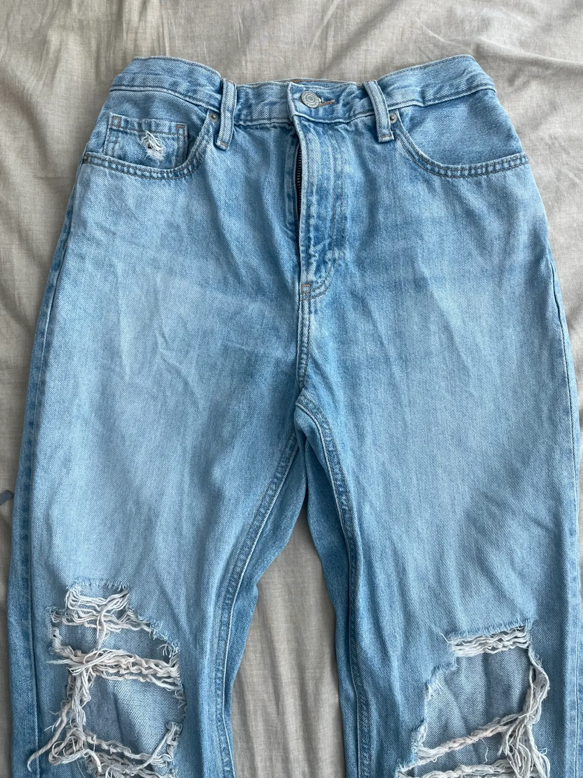 Ripped Light Wash Jeans thumbnail