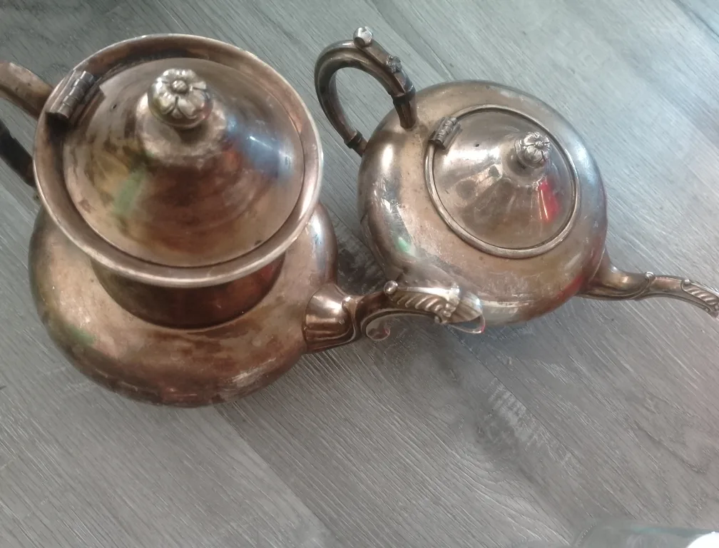 Antique copper kettles thumbnail