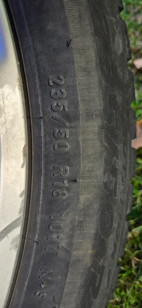 4 Studded Perrelis Chevrolet Rims with Winter Tires - 235/50R18 image indicator(2)