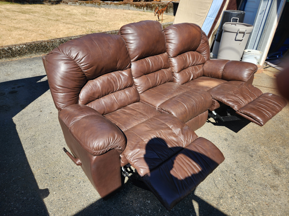 Brown Leather Reclining Sofa
