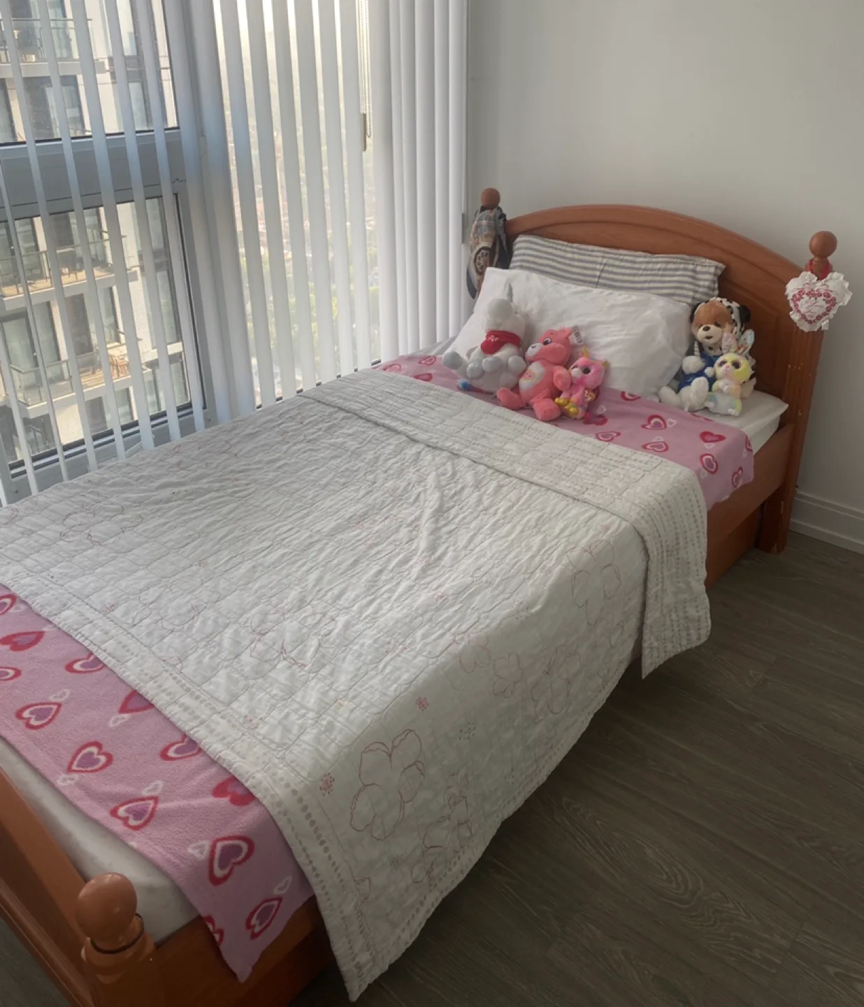 Wooden bed with pullout underneath thumbnail