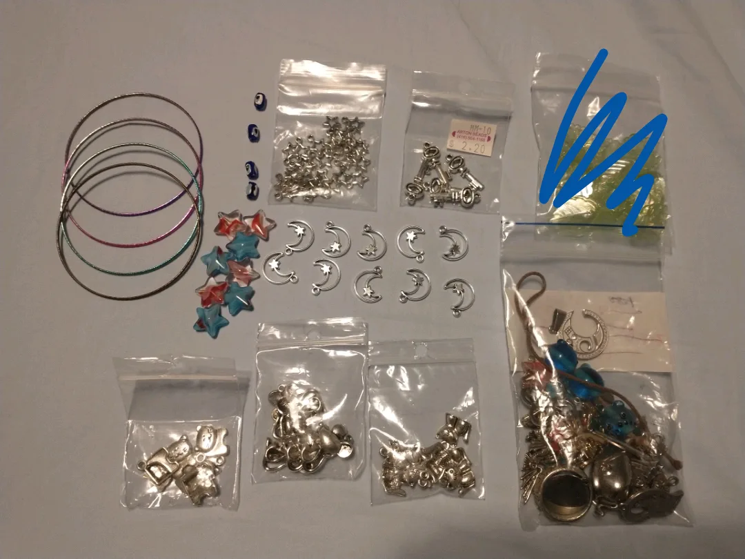 Large assortment of charms and pendants for jewellery making image indicator(7)
