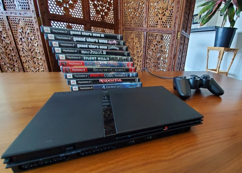 PlayStation 2 Console with Games & Controller