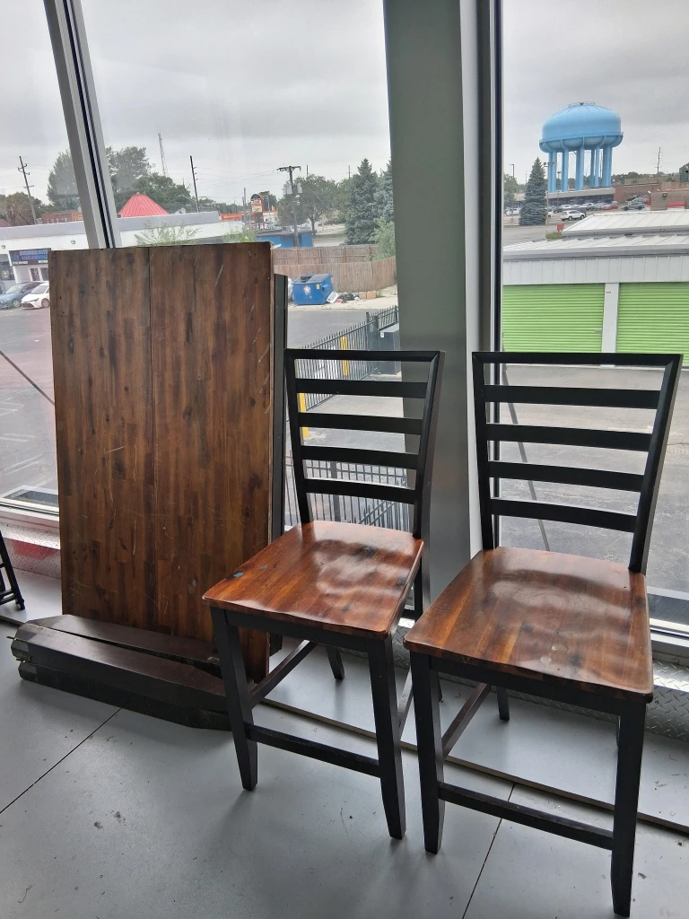 Two Wooden Bar Stools with table