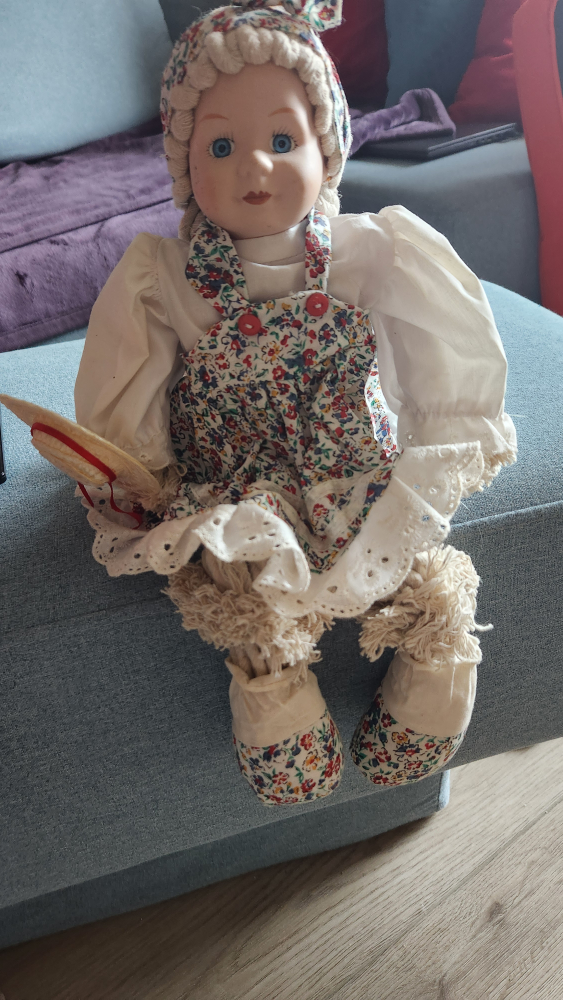 Vintage Porcelain Doll with Floral Dress