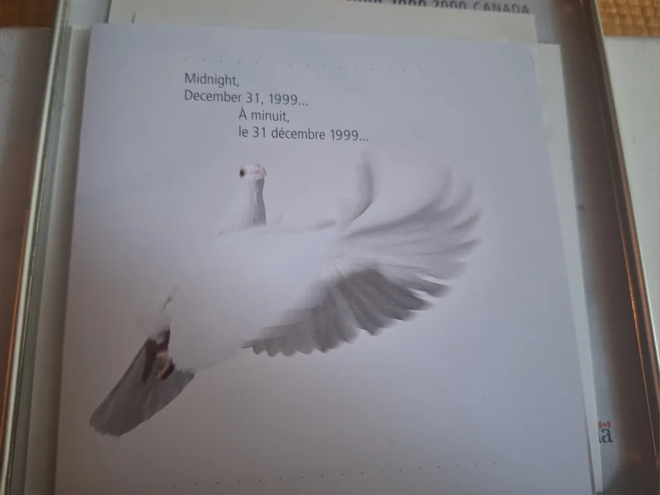 1999-2000 Canada Post Millennium Keepsake Stamps & Coin  Set image indicator(8)