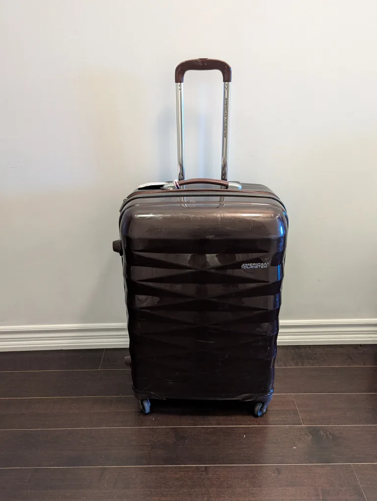 American Tourister Spinner 23"- Wine color image indicator(9)