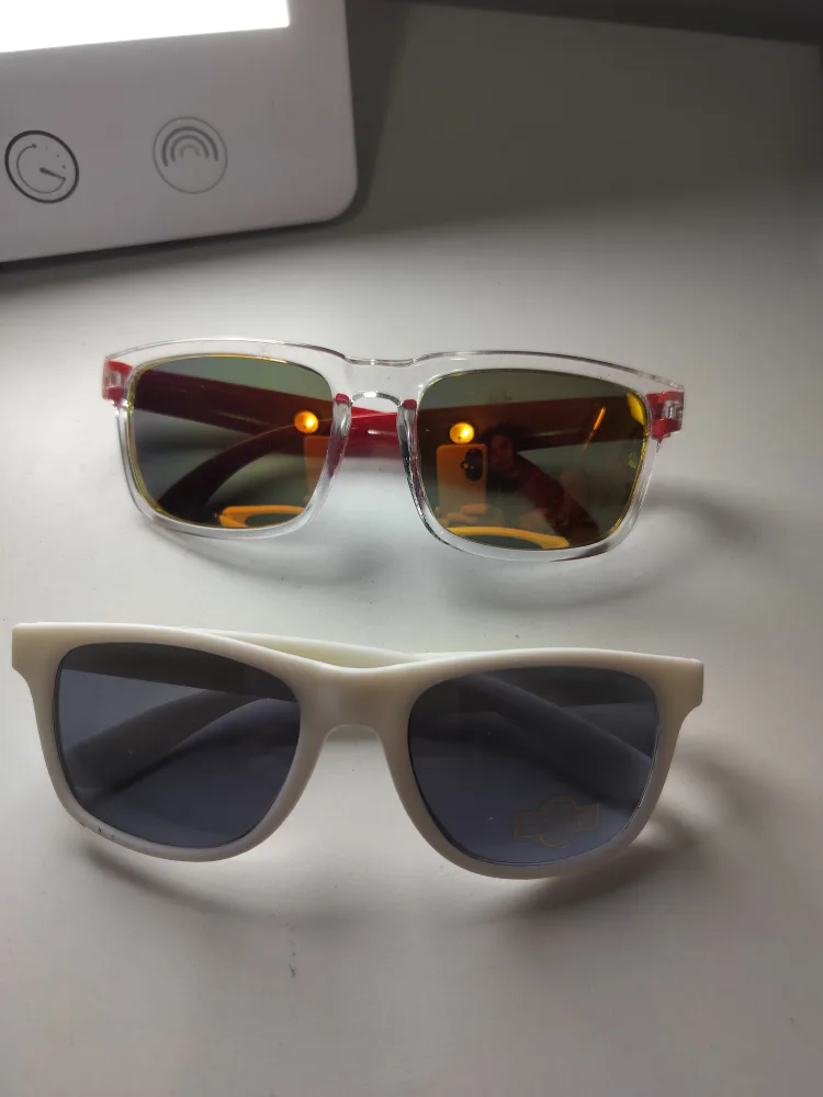 Two Pairs of Sunglasses thumbnail