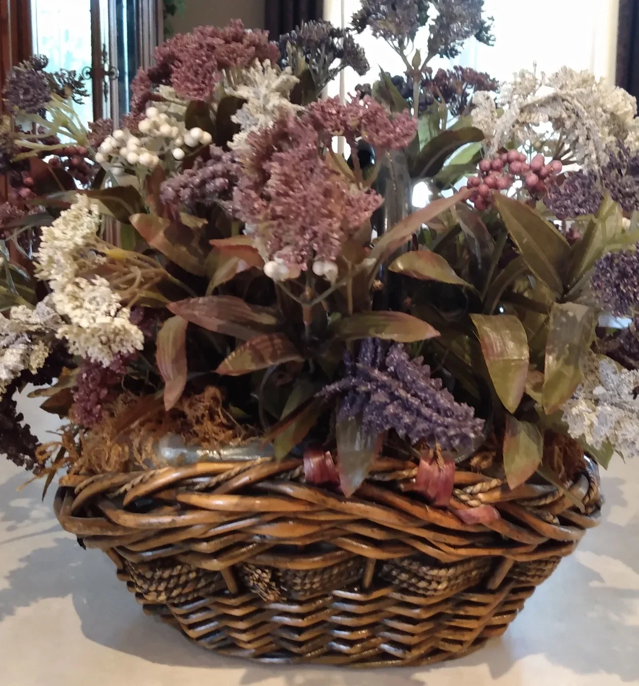 Antique Floral Arrangement in Wicker Basket thumbnail
