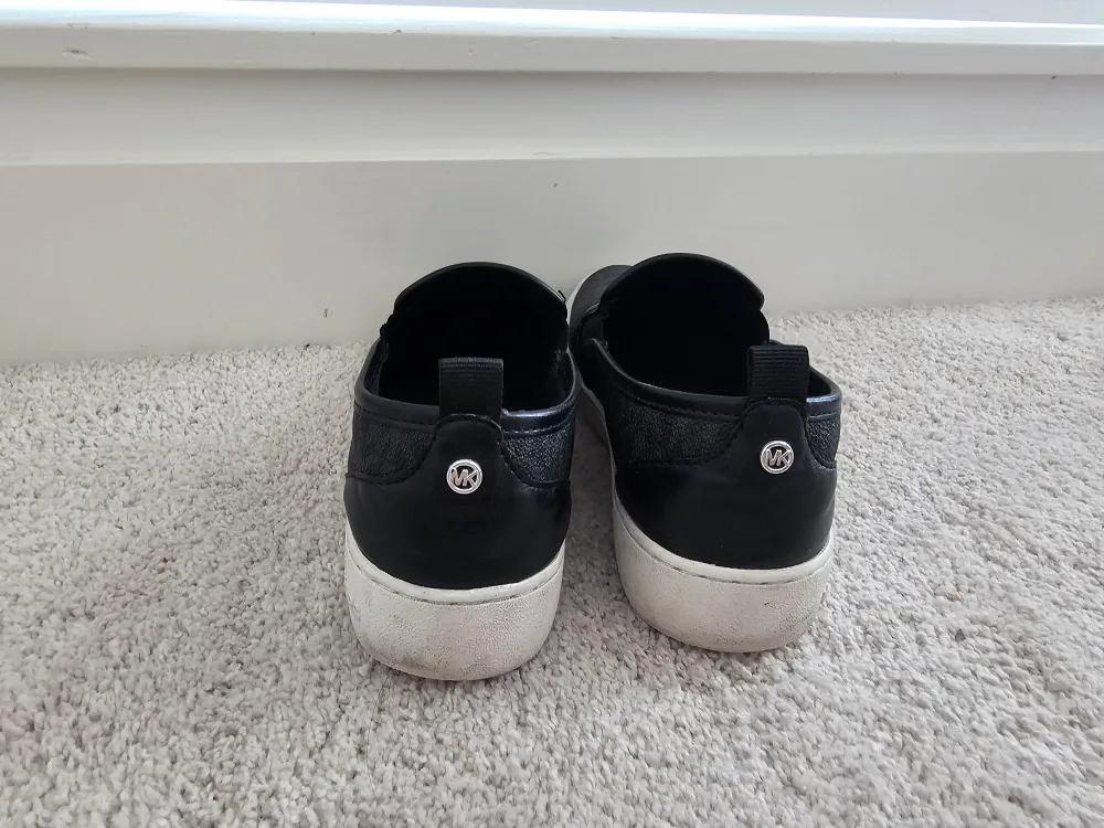 Michael Kors Black Slip-On Sneakers Size 5 image indicator(3)