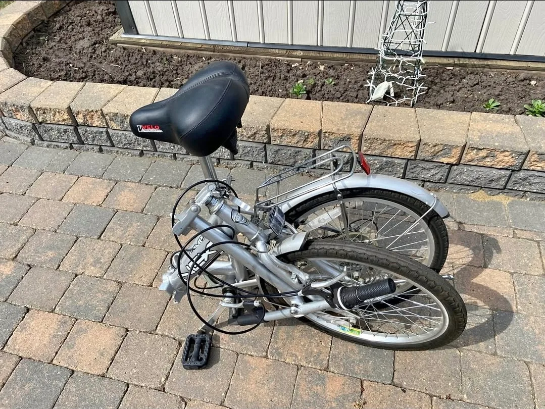 2 Like New NEXT Compact Folding Bicycles With Kickstands. image indicator(2)