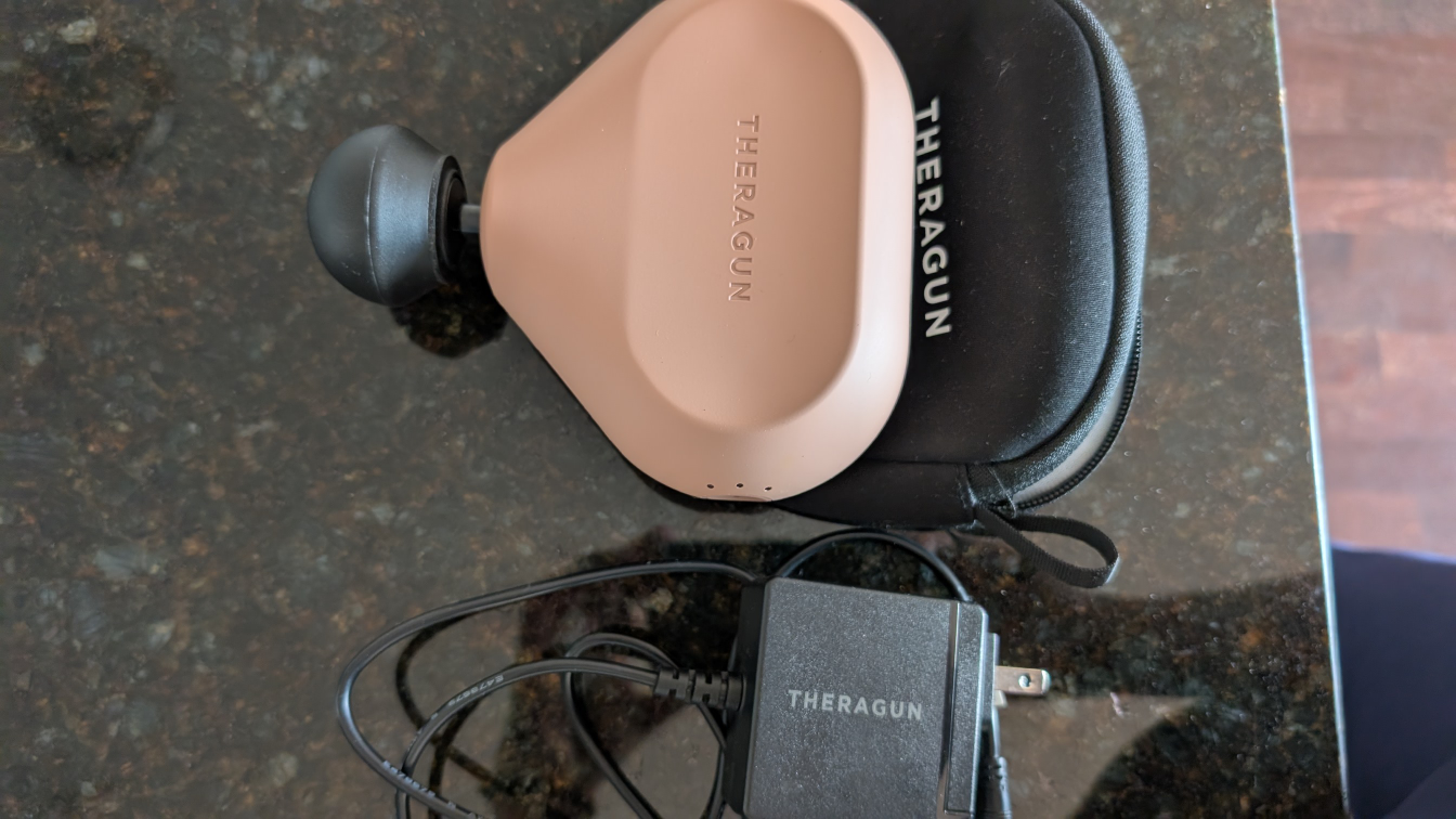 Theragun Mini Massage Gun with Charger - photo 2